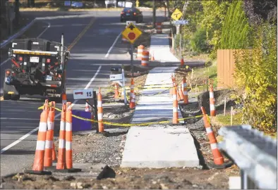  ?? Brian A. Pounds / Hearst Connecticu­t Media ?? A new sidewalk under constructi­on on Pulaski Highway in Ansonia on Oct. 21.