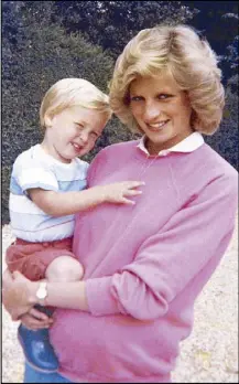  ?? AP ?? File photo shows the late Princess Diana holding Prince William while pregnant with Prince Harry in London.