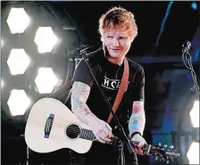  ?? KEVORK DJANSEZIAN/GETTY IMAGES/TNS ?? Ed Sheeran performs during the 2017 Grammy Awards.