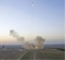  ?? — AP ?? JIUQUAN: In this photo released by Xinhua News Agency, the Long March-2F carrier rocket carrying China’s Shenzhou 11 manned spacecraft blasts off from the launch pad at the Jiuquan Satellite Launch Center.