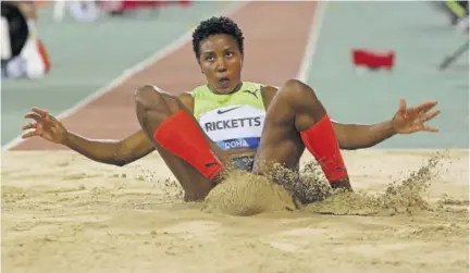  ?? (Photos: AFP) ?? Jamaica’s Shanieka Ricketts competes during the women’s triple jump event during the IAAF Diamond League athletics Doha meeting at the Khalifa Internatio­nal stadium in the Qatar capital of Doha on Friday.