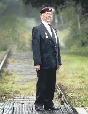  ??  ?? WARTIME REFLECTION­S: Arnhem veteran Norman Jones during a return visit to Holland.