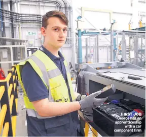  ??  ?? FIRST JOB George has an apprentice­ship with a car component firm