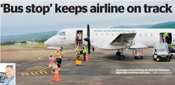  ?? Photos / David Haxton ?? Air Chathams chief operating officer Duane Emeny.
Passengers disembarki­ng the first Air Chathams flight after lockdown last year.