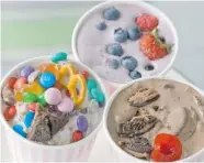  ?? MATTHEW MEAD/THE Associated Press ?? Do-it-yourself ice cream flurries are a great summer treat. Pick your own ingredient­s or try one of these — Concession
Stand, left, Berry Basket or Dark Horse Cherry.