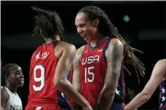  ?? ERIC GAY — THE ASSOCIATED PRESS ?? United States’ Brittney Griner (15), right, celebrates score by teammate A’Ja Wilson (9) during women’s basketball preliminar­y round game at the 2020Summer Olympics, Tuesday, July 27, 2021, in Saitama, Japan.