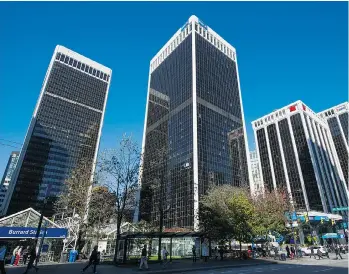  ?? GERRY KAHRMANN/PNG FILES ?? The Bentall Centre, above, and Royal Centre in downtown Vancouver are up for sale and will likely have new owners this year. The two towers represent 2.1 million square feet of top-end office space.