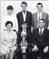  ??  ?? The 1968/69 Mallow Presidents Trophy-winning team of (back row) Manus O’Callaghan, Graham Morphy, Rory Barratt, and Jimmy Gyves (with trophy). Also pictured are Ita O’Leary, Mallow Red Cross; and Pat Organ, water safety examiner.