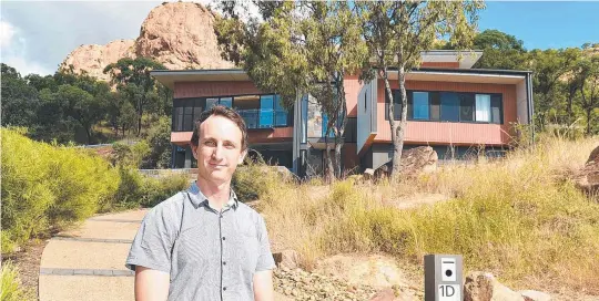  ?? NATURAL APPEAL: Architect Mark Kennedy at the house in Stuart St that is up for the NQ Architectu­re Awards. ??