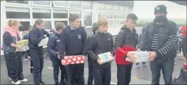  ?? (Pic: Rachel Kelly) ?? Pupils from Kildorrery National School took part in 2021’s Team Hope Shoebox appeal, pictured handing over the shoeboxes recently.