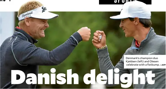  ?? —AFP ?? Denmark’s champion duo Kjeldsen (left) and Olesen celebrate with a fistbump.