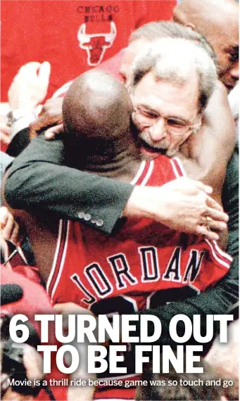  ?? AP ?? Phil Jackson and Michael Jordan embrace after the Bulls beat the Jazz for their sixth NBA championsh­ip.