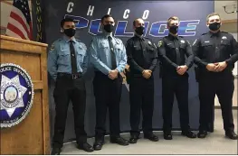  ?? WILL DENNER — ENTERPRISE-RECORD ?? From left to right, Chico Police Department public safety dispatcher Diego Arzate Navarro, community service officer Samuel Noble, and officers Michael Vincent, Timothy Simpson and Juan Jose Valencia pose for a photo after a badge pinning and swearing-in ceremony Thursday morning in Chico.