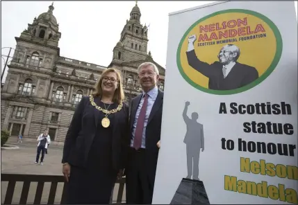  ??  ?? Lord Provost Eva Bolander and Sir Alex Ferguson launch the campaign, above. Mandela receiving the Freedom of Glasgow, below