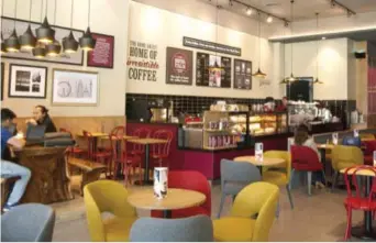  ??  ?? The attraction of coffee shops, like the Costa Coffee in One World Place, as a ‘coffice’ can be summed up as providing a venue for convenienc­e, community, collaborat­ion, and creativity.