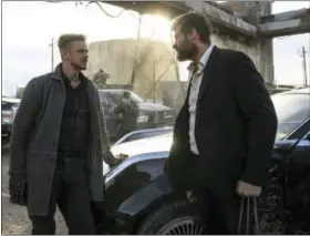  ?? BEN ROTHSTEIN/TWENTIETH CENTURY FOX VIA AP ?? This image released by Twentieth Century Fox shows Boyd Holbrook, left, and Hugh Jackman in a scene from “Logan.”