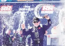  ?? TIMES-DISPATCH VIA AP
JAMES H. WALLACE/RICHMOND ?? Ty Gibbs celebrates in Victory Lane after winning the NASCAR Xfinity Series race Saturday at Richmond Raceway.