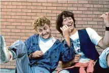  ?? MGM ?? Keanu Reeves (right), as Ted, and Alex Winter, as Bill, rock on in the 1989 comedy “Bill & Ted’s Excellent Adventure.”