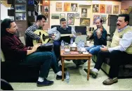  ?? WALEED AL-KHALID / AGENCE FRANCE-PRESSE ?? Iraqi musicians perform live music at a book fair in Mosul, Iraq, on