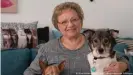  ??  ?? Ilona Barber with her dogs in her Fuggerei apartment