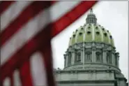  ?? MATT ROURKE — THE ASSOCIATED PRESS ?? This Wednesday file photo shows the Pennsylvan­ia Capitol building in Harrisburg, Pa. An Associated Press analysis, using a new statistica­l method of calculatin­g partisan advantage, finds traditiona­l battlegrou­nds such as Michigan, North Carolina,...