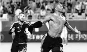  ?? JACOB LANGSTON/ORLANDO SENTINEL ?? Orlando City's Julio Baptista celebrates after scoring a late goal against San Jose at Camping World Stadium.