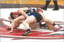  ?? COURTESY PHOTO ?? McDonald County’s Jack Teague earns his way to state with a win over Isaiah Ragsdale of Marshfield in the consolatio­n semifinals at 152 pounds at the Missouri Class 3 District 3 Wrestling Championsh­ips held Feb. 8-9 at Union High School.