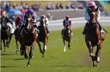  ??  ?? Enable (right), with Frankie Dettori up, gets the better of Alluring (Ryan Moore) to win the Cheshire Oaks