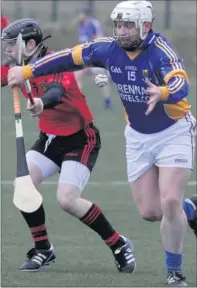  ??  ?? Wicklow’s Andy O’Brien gathers the ball ahead of Down’s Eoin Clarke.