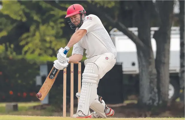  ?? Picture: JUSTIN BRIERTY ?? ATTITUDE KEY: Mulgrave batsman Justin Reed blocks a ball during the match against United at Griffiths Park. The club will play its seventh consecutiv­e two-day grand final this season, starting this Saturday against Atherton.