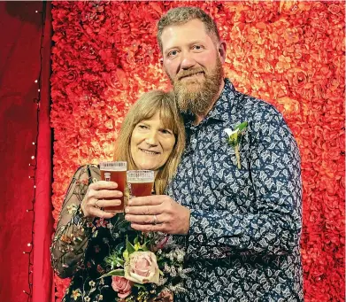  ?? OLLY COLEMAN ?? Lower Hutt couple Dan Smith and Judy Horsburgh tied the knot at Beervana yesterday, making history as the first couple to get married at the annual beverage festival.