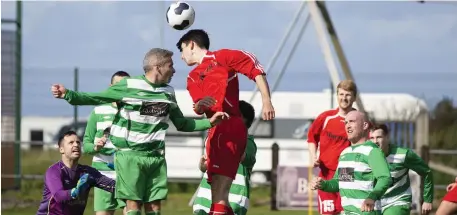  ??  ?? Action from MCR v Strand Celtic. Pics: Donal Hackett.