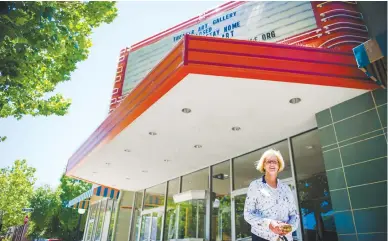  ?? Chris Kaufman/appeal-democrat ?? Terri Tomlinson, with the Sutter Performing Arts Associatio­n, stands in front of the Sutter Theater in Yuba City.