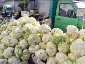  ?? CAIN BURDEAU VIA AP ?? Shown are mounds of cauliflowe­r for sale at the weekly market in Ceglie Messapica, a town in the Valle d’Itria in Puglia, Italy.