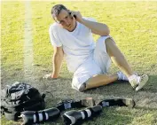  ?? Picture: RAYMOND PRESTON ?? FAST LIFE: Oscar Pistorius takes a call in a break from training at the University of Pretoria