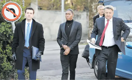  ?? Picture: AFP ?? GAME ON. Olympic 800m champion Caster Semenya, centre, and her lawyer Gregory Nott, right, arrive for a landmark hearing at the Court of Arbitratio­n for Sport in Lausanne yesterday. Semenya is challengin­g a proposed rule by the IAAF aiming to restrict testostero­ne levels in female runners.