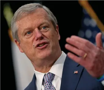  ?? MAtt StOnE / HERALD StAFF FILE ?? STAY VIGILANT: Gov. Charlie Baker warned Friday that the new more-contagious strain of the coronaviru­s is likely already in Massachuse­tts and residents must continue wearing masks and social distancing to help keep the virus at bay.