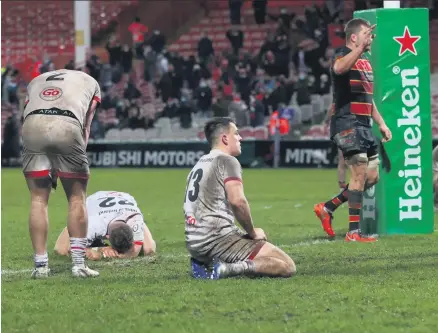  ??  ?? Losing out:
Ulster’s Ian Madigan, Rob Herring and James Hume dejected at the end of the game in Gloucester