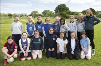  ??  ?? Young players with coach Laoise McBrien.