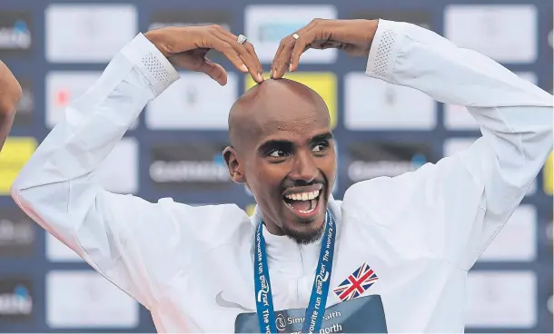  ??  ?? FIVE ALIVE: Mo Farah celebrates in customary style after his Great North Run success last year