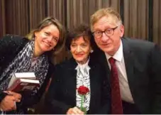  ??  ?? Elizabeth Bellak, center, 88,
poses with her daughter Alexandra Renata, left, and filmmaker Tomasz Magierski during a screening of the documentar­y film ‘Broken Dreams’ on Elizabeth’s sister
Renia Spiegel in Warsaw.