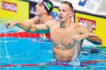  ??  ?? US Caeleb Remel Dressel reacts after competing in the men’s 50m freestyle final during the swimming competitio­n at the 2017 FINA World Championsh­ips in Budapest, on July 29, 2017. - AFP photo