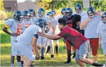  ?? JIM THOMPSON/JOURNAL ?? MAS assistant coach Jeremiah Langston, brother of head coach Bruce Langston, instructs players during practice.