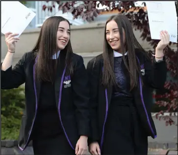  ??  ?? Bannerman High School pupils Carmen and Lauren Wright both achieved great results