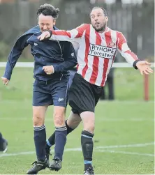  ??  ?? Ryhope Foresters (stripes) battle Easington CIU Over-40s.