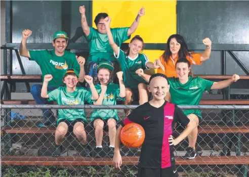  ??  ?? GIRL POWER: Under 13s Heat Girls player Raychel, backed by screaming Heat fans, will be there to support the team when they take on Brisbane Olympic at Endeavour Park, Manunda, tonight. Picture: BRENDAN RADKE