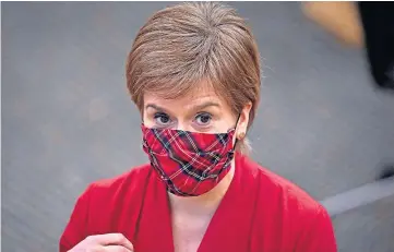  ??  ?? CHALLENGED: Nicola Sturgeon during First Minister’s Questions at Holyrood.