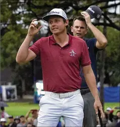  ?? MATT YORK / ASSOCIATED PRESS ?? Cameron Smith celebrates his win on the 10th green after the final round of the Sony Open PGA Tour golf event Sunday at Waialae Country Club in Honolulu.