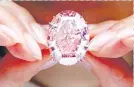  ??  ?? The 59.6-carat “Pink Star” diamond has sold for US$71.2 million at a Sotheby’s auction in Hong Kong, setting a record for any jewel. /AP Photo HONG KONG