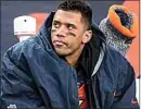  ?? DAVID ZALUBOWSKI — STAFF ?? Denver Broncos quarterbac­k Russell Wilson sits on the bench in the second half of a game Dec. 31 in Denver.